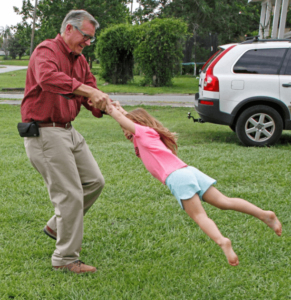 Jim playing with his daughter